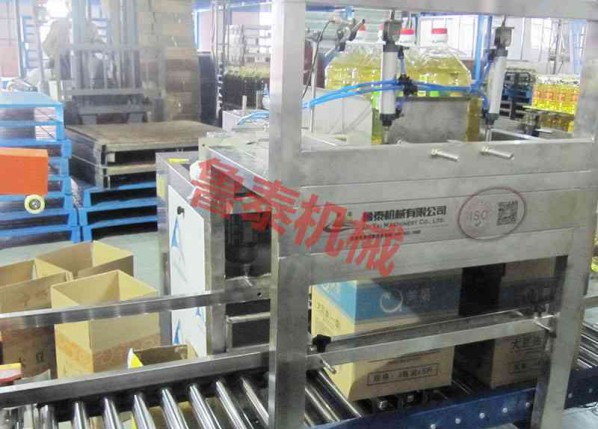 Automatic drop type boxing machine